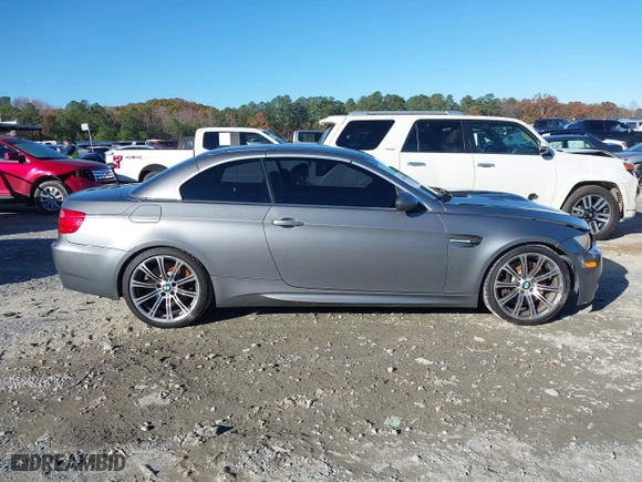 2011 BMW M3 with VIN WBSDX9C57BE584727, listed as a IAAI auction lot 40921043 with 148,068 mi miles. Bid and sale history available at carsss.com. Image 13.