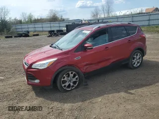 2014 Ford Escape Titanium with VIN 1FMCU9J94EUE49129, listed as a Copart auction lot 54357125 with 205,519 mi miles and Salvage Title. Bid and sale history available at carsss.com. Image 1.