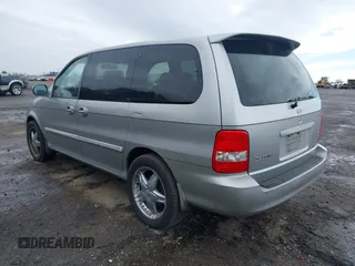 2004 Kia Sedona LX with VIN KNDUP131246567448, listed as a IAAI auction lot 41842992 with 231,424 mi miles. Bid and sale history available at carsss.com. Image 3.