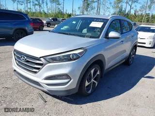 2016 Hyundai Tucson Sport with VIN KM8J33A25GU224084, listed as a IAAI auction lot 41827851 with 153,348 mi miles. Bid and sale history available at carsss.com. Image 17.