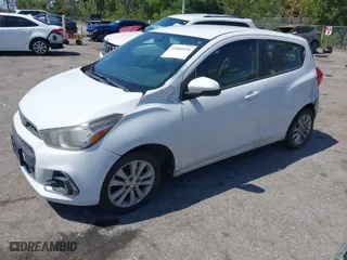2016 Chevrolet Spark LT with VIN KL8CD6SA9GC575001, listed as a IAAI auction lot 41801694 with 99,194 mi miles. Bid and sale history available at carsss.com. Image 2.