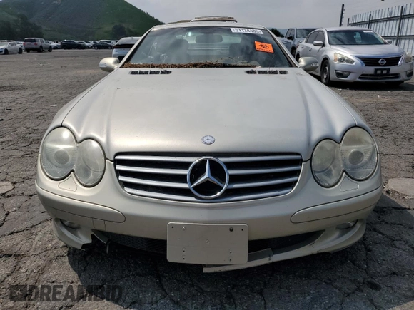 2003 Mercedes-Benz SL 500 z VIN WDBSK75F03F013100, wystawiony jako Copart lot #51124485 z przebiegiem Nie podano mil oraz Czysty tytuł • Clean title. Historia ofert i sprzedaży dostępna na DreamBid. Obrazek 5.