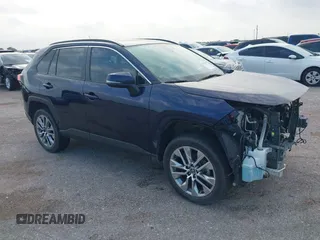 2022 Toyota RAV4 XLE Premium with VIN 2T3C1RFV5NW211019, listed as a IAAI auction lot 42130420 with 52,097 mi miles and . Bid and sale history available at DreamBid. Image 1.