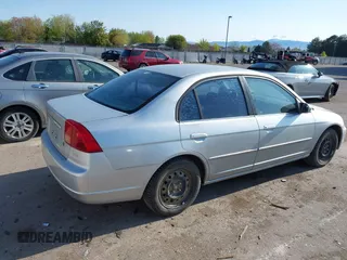 2001 Honda Civic EX with VIN 2HGES26771H512949, listed as a IAAI auction lot 42020043 with 299,833 mi miles. Bid and sale history available at carsss.com. Image 4.