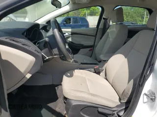 2016 Ford Focus SE с VIN 1FADP3F29GL323601, выставлен на аукционе Copart как лот 56407185 с пробегом 57 000 миль миль и Списание • Salvage title. История ставок и продаж доступна на DreamBid. Изображение 7.
