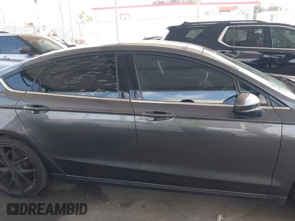 2017 Ford Fusion SE with VIN 3FA6P0HDXHR242034, listed as a IAAI auction lot 42356463 with 65,584 mi miles and . Bid and sale history available at DreamBid. Image 14.
