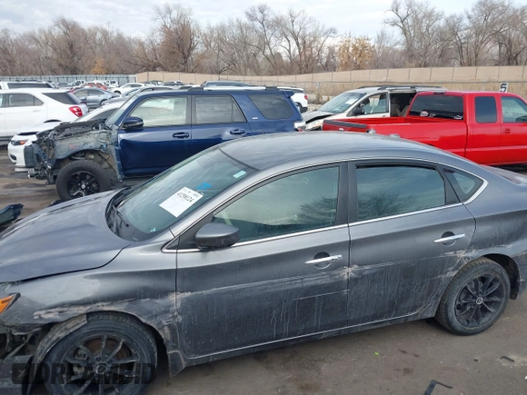 2019 Nissan Sentra S z VIN 3N1AB7AP4KY424604, wystawiony jako IAAI lot #41298124 z przebiegiem 73 000 mil mil oraz . Historia ofert i sprzedaży dostępna na DreamBid. Obrazek 12.