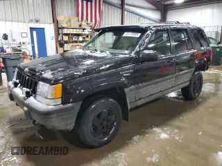 1995 Jeep Grand Cherokee Laredo with VIN 1J4GZ58Y5SC565187, listed as a Copart auction lot 45179985 with 122,863 mi miles and Salvage Title. Bid and sale history available at carsss.com. Image 1.