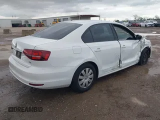 2016 Volkswagen Jetta Sedan 1.4T S w/Technology with VIN 3VW267AJ0GM311469, listed as a IAAI auction lot 41914668 with 83,223 mi miles. Bid and sale history available at carsss.com. Image 4.