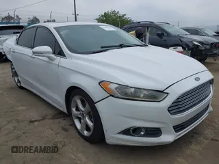2014 Ford Fusion SE Hybrid with VIN 3FA6P0LU0ER189444, listed as a IAAI auction lot 42291020 with 187,148 mi miles and . Bid and sale history available at DreamBid. Image 1.