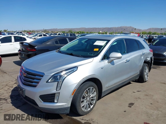 2017 Cadillac XT5 Luxury AWD z VIN 1GYKNDRS1HZ293429, wystawiony jako IAAI lot #42453704 z przebiegiem 92 347 mil mil oraz . Historia ofert i sprzedaży dostępna na DreamBid. Obrazek 17.