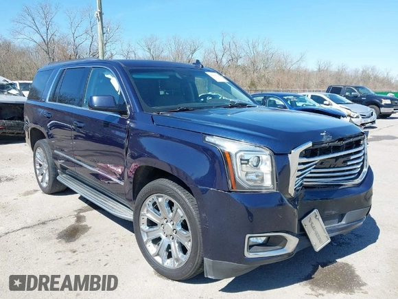 2017 GMC Yukon SLT with VIN 1GKS1BKC9HR356600, listed as a IAAI auction lot 41694218 with 155,855 mi miles. Bid and sale history available at carsss.com. Image 1.