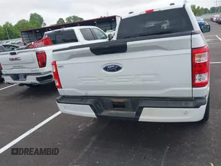 2021 Ford F-150 XL with VIN 1FTEX1C51MFD08456, listed as a IAAI auction lot 42220056 with 52,437 mi miles and . Bid and sale history available at DreamBid. Image 16.