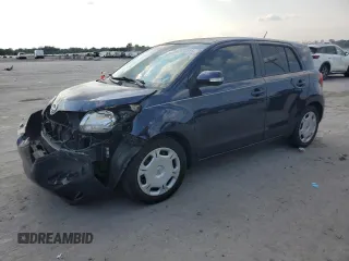 2013 Scion xD with VIN JTKKUPB46D1029968, listed as a Copart auction lot 60426415 with 111,504 mi miles and Salvage title. Bid and sale history available at DreamBid. Image 1.