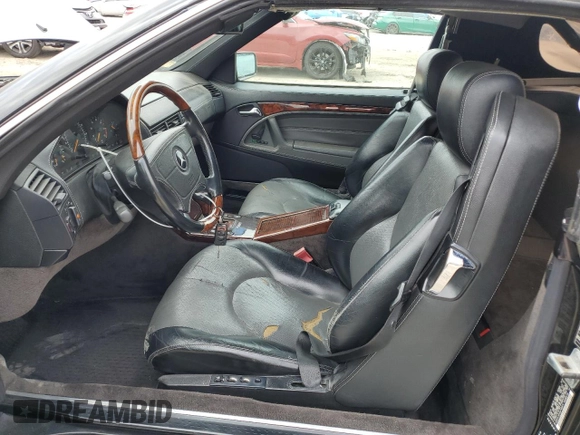 1998 Mercedes-Benz SL z VIN WDBFA76F6WF165874, wystawiony jako Copart lot #53392195 z przebiegiem 141 126 mil mil oraz Tytuł czysty. Historia ofert i sprzedaży dostępna na DreamBid. Obrazek 7.