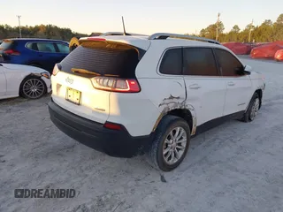 2019 Jeep Cherokee Latitude with VIN 1C4PJLCB1KD128463, listed as a IAAI auction lot 41813221 with 158,792 mi miles and . Bid and sale history available at carsss.com. Image 4.