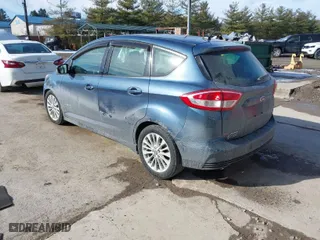 2018 Ford C-Max Hybrid SE with VIN 1FADP5AU1JL104465, listed as a IAAI auction lot 41654148 with 95,700 mi miles. Bid and sale history available at carsss.com. Image 3.