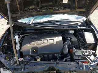 2019 Toyota Corolla L with VIN 5YFBURHE2KP935806, listed as a IAAI auction lot 41673090 with 61,926 mi miles. Bid and sale history available at carsss.com. Image 10.