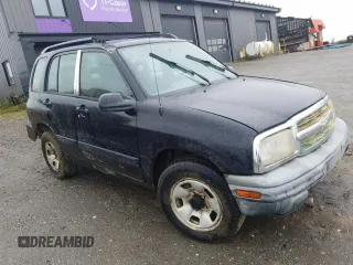 2003 Chevrolet Tracker z VIN 2CNBJ13C236901119, wystawiony jako Copart lot #68736774 z przebiegiem Nie podano mil oraz Szkoda całkowita • Salvage title. Historia ofert i sprzedaży dostępna na DreamBid. Obrazek 4.