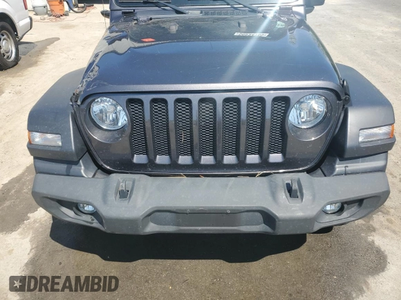 2020 Jeep Wrangler Unlimited Black and Tan with VIN 1C4HJXDGXLW221705, listed as a Copart auction lot 56224785 with 82,360 mi miles and Salvage title. Bid and sale history available at DreamBid. Image 12.