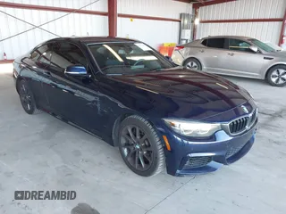 2018 BMW 4 Series 440i xDrive z VIN WBA4W9C5XJAC99147, wystawiony jako IAAI lot #41947601 z przebiegiem 94 460 mil mil oraz . Historia ofert i sprzedaży dostępna na DreamBid. Obrazek 1.