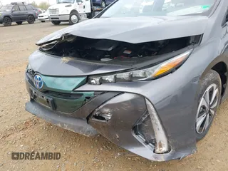 2018 Toyota Prius Plus with VIN JTDKARFP6J3078362, listed as a IAAI auction lot 42021835 with 61,170 mi miles and . Bid and sale history available at DreamBid. Image 6.