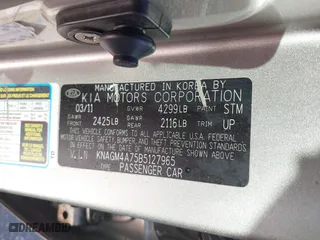 2011 Kia Optima LX with VIN KNAGM4A75B5127965, listed as a IAAI auction lot 40544326 with 207,760 mi miles. Bid and sale history available at carsss.com. Image 9.