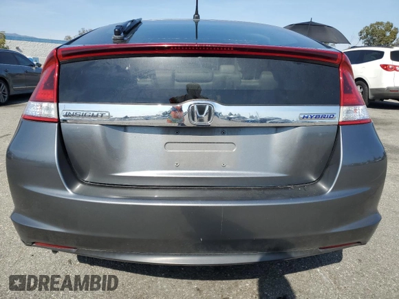 2012 Honda Insight EX z VIN JHMZE2H77CS002907, wystawiony jako Copart lot #52040465 z przebiegiem 158 266 mil mil oraz Szkoda całkowita • Salvage title. Historia ofert i sprzedaży dostępna na DreamBid. Obrazek 6.