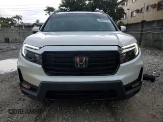 2023 Honda Ridgeline RTL-E with VIN 5FPYK3F76PB064582, listed as a Copart auction lot 63629375 with 11,940 mi miles and Salvage title. Bid and sale history available at DreamBid. Image 5.