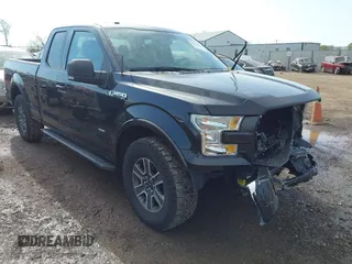 2015 Ford F-150 XLT with VIN 1FTEX1EP1FFC73368, listed as a IAAI auction lot 42036914 with 114,916 mi miles. Bid and sale history available at carsss.com. Image 1.