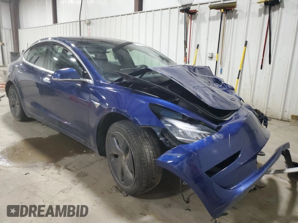 2020 Tesla Model 3 Standard Range Plus with VIN 5YJ3E1EA3LF803784, listed as a Copart auction lot 52881375 with 88,912 mi miles and Salvage Title. Bid and sale history available at DreamBid. Image 4.