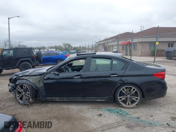 2018 BMW 5 Series M550i xDrive with VIN WBAJB9C56JB286742, listed as a IAAI auction lot 42176643 with 61,445 mi miles and . Bid and sale history available at DreamBid. Image 15.