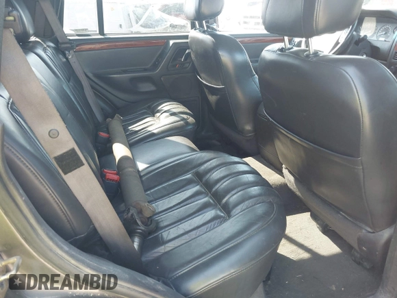 1999 Jeep Grand Cherokee Limited with VIN 1J4GW68N7XC617687, listed as a IAAI auction lot 42433705 with 186,312 mi miles and . Bid and sale history available at DreamBid. Image 8.