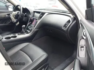 2015 Infiniti Q50 Premium z VIN JN1BV7AP2FM344044, wystawiony jako IAAI lot #42217012 z przebiegiem 155 714 mil mil oraz . Historia ofert i sprzedaży dostępna na DreamBid. Obrazek 5.