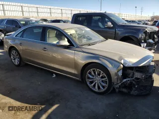 2012 Audi A8 with VIN WAURVAFDXCN001749, listed as a Copart auction lot 44379515 with 169,860 mi miles and Salvage Title. Bid and sale history available at DreamBid. Image 4.