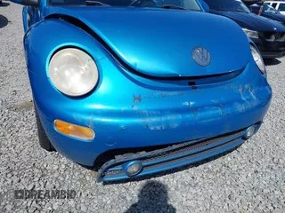 2004 Volkswagen New Beetle Coupe Satellite Blue with VIN 3VWGK31C14M420613, listed as a IAAI auction lot 42046048 with 117,274 mi miles. Bid and sale history available at carsss.com. Image 6.