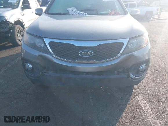 2013 Kia Sorento LX with VIN 5XYKT4A28DG394676, listed as a IAAI auction lot 41409435 with 167,003 mi miles. Bid and sale history available at carsss.com. Image 6.