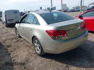 2014 Chevrolet Cruze 1LT with VIN 1G1PC5SB9E7180989, listed as a IAAI auction lot 42230408 with 112,927 mi miles and . Bid and sale history available at DreamBid. Image 3.