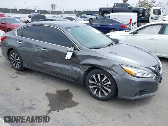 2016 Nissan Altima S z VIN 1N4AL3AP5GC131352, wystawiony jako IAAI lot #42418679 z przebiegiem 106 576 mil mil oraz . Historia ofert i sprzedaży dostępna na DreamBid. Obrazek 1.