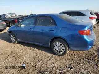 2009 Toyota Corolla with VIN JTDBL40E699085891, listed as a Copart auction lot 46706975 with 36,141 mi miles and Salvage Title. Bid and sale history available at carsss.com. Image 2.