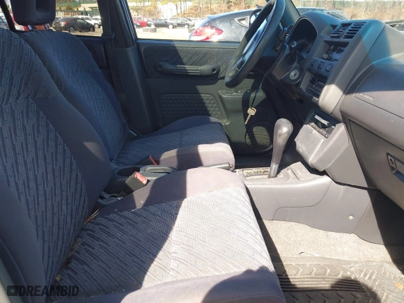 1998 Toyota RAV4 with VIN JT3GP10V9W7038486, listed as a IAAI auction lot 41778465 with 157,143 mi miles. Bid and sale history available at carsss.com. Image 5.
