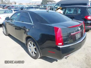 2008 Cadillac CTS RWD w/1SB with VIN 1G6DR57V280153578, listed as a IAAI auction lot 41615630 with 169,327 mi miles. Bid and sale history available at carsss.com. Image 3.