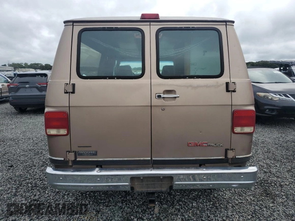 1995 GMC Rally z VIN 1GJGG39K6SF525508, wystawiony jako Copart lot #74144674 z przebiegiem Nie podano mil oraz Szkody całkowita. Historia ofert i sprzedaży dostępna na DreamBid. Obrazek 6.