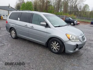 2009 Honda Odyssey EX-L with VIN 5FNRL387X9B043289, listed as a IAAI auction lot 41951208 with 197,184 mi miles. Bid and sale history available at carsss.com. Image 1.