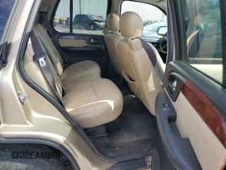 2005 GMC Envoy SLT with VIN 1GKDS13S552135280, listed as a Copart auction lot 68097344 with 165,924 mi miles and Salvage Title. Bid and sale history available at carsss.com. Image 10.