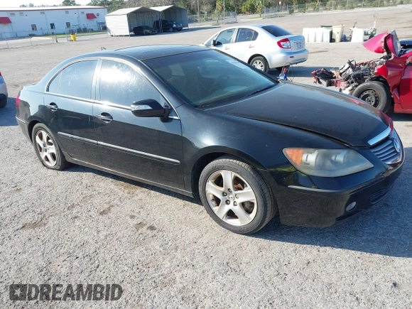 2006 Acura RL z VIN JH4KB16516C011235, wystawiony jako IAAI lot #41587245 z przebiegiem 157 117 mil mil oraz . Historia ofert i sprzedaży dostępna na DreamBid. Obrazek 1.