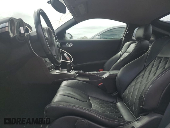 2003 Nissan 350Z with VIN JN1AZ34D73T103916, listed as a Copart auction lot 73709474 with 126,353 mi miles and Salvage Title. Bid and sale history available at carsss.com. Image 7.