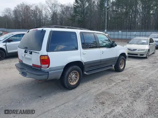2000 Mercury Mountaineer with VIN 4M2ZU66P9YUJ19036, listed as a IAAI auction lot 41663230 with 159,635 mi miles. Bid and sale history available at carsss.com. Image 4.