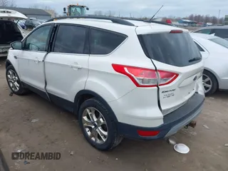 2016 Ford Escape SE with VIN 1FMCU9G94GUB55448, listed as a IAAI auction lot 41854864 with 153,457 mi miles. Bid and sale history available at carsss.com. Image 3.
