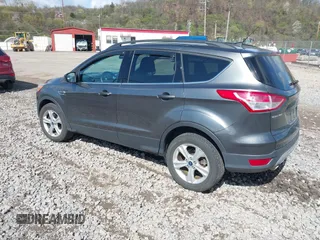 2016 Ford Escape SE with VIN 1FMCU9GX5GUA06660, listed as a IAAI auction lot 42043031 with 87,719 mi miles. Bid and sale history available at carsss.com. Image 3.